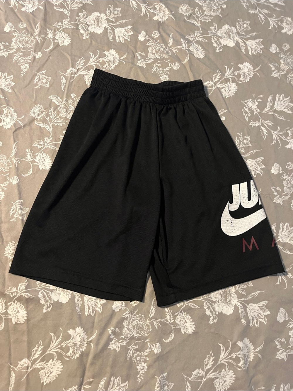 Nike Black Athletic Shorts with White Swoosh